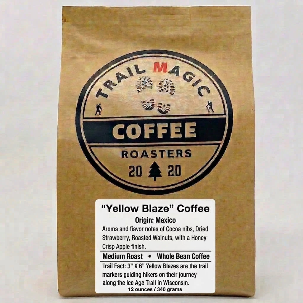 Kraft paper coffee bag with 'Trail Magic Coffee Roasters' branding on a white background