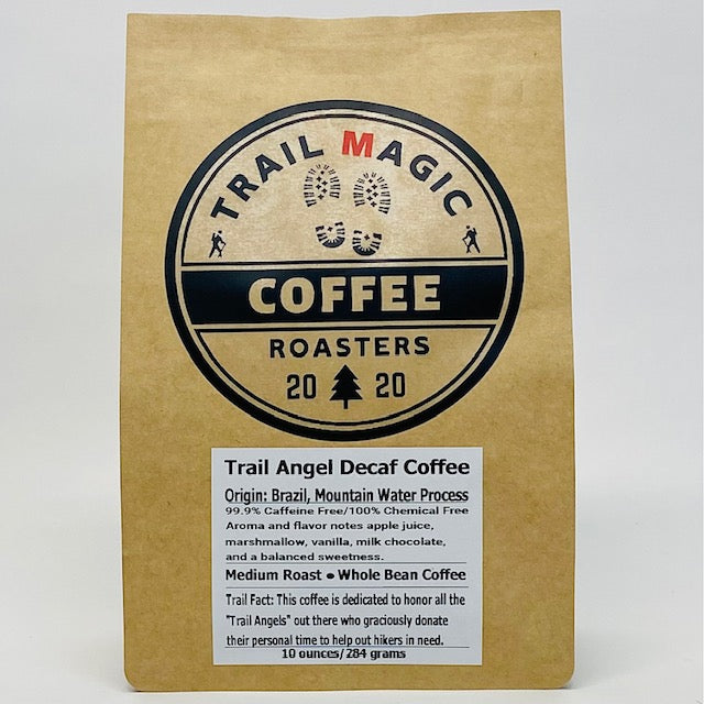 Kraft paper coffee bag with 'Trail Magic Coffee Roasters' branding on a white background